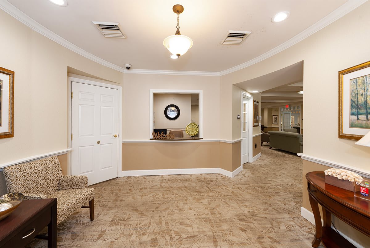 A well-lit reception area with neutral decor and comfortable seating.