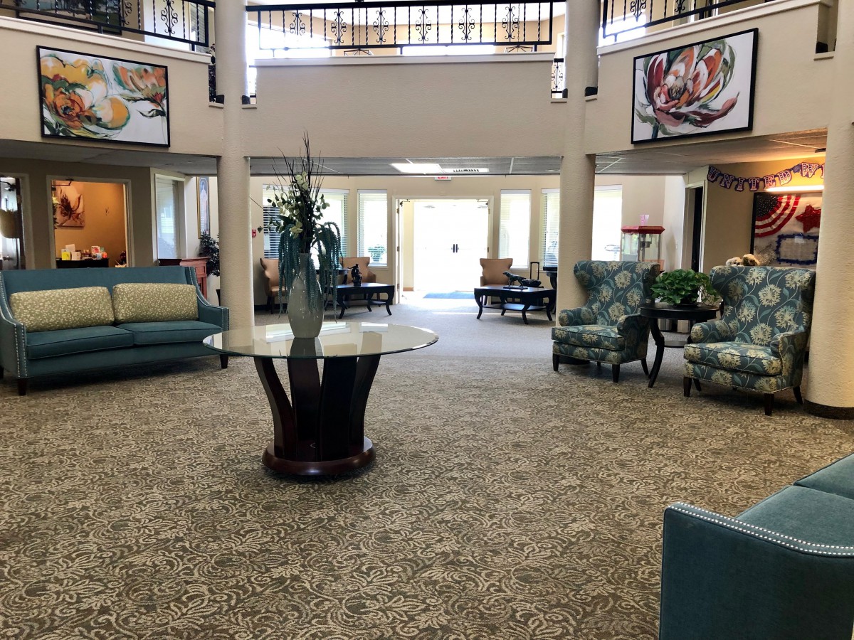 A spacious and elegantly decorated lobby with comfortable seating areas.