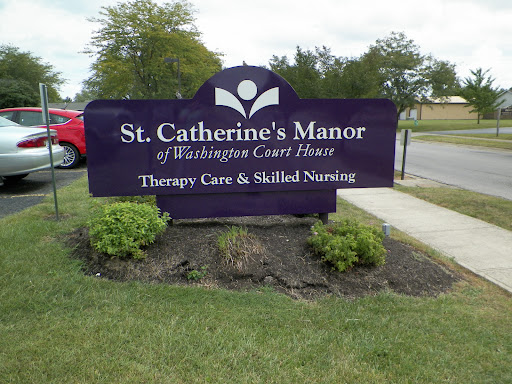 Sign for St. Catherine's Manor, offering therapy care and skilled nursing services.