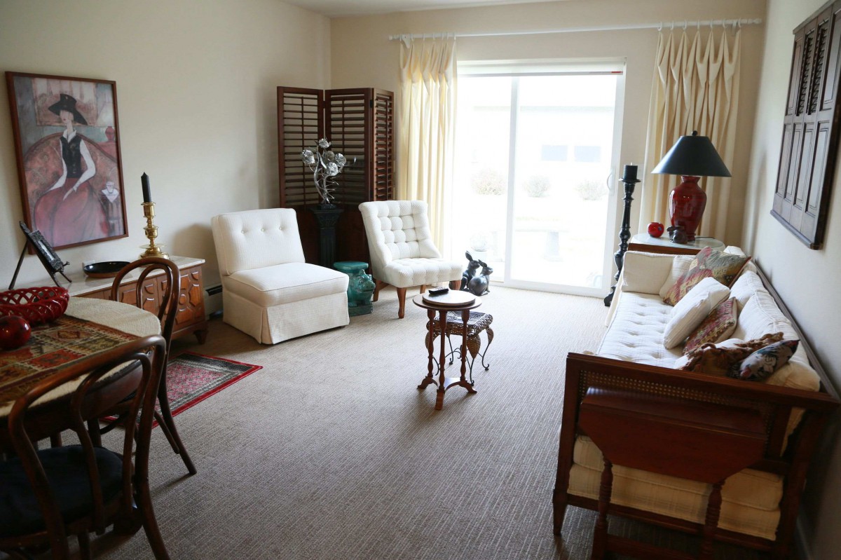 A cozy living room with comfortable seating and tasteful decor.