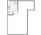 A simple floor plan of a studio apartment with a bathroom.