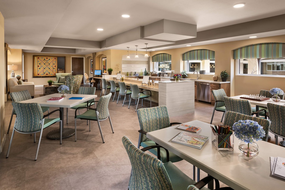 A modern cafe interior with ample seating and stylish decor.