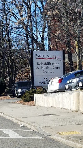 Parson's Hill Rehabilitation & Health Care Center sign outside a facility.