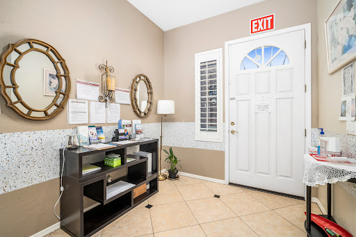 A welcoming entrance featuring modern decor, a stylish console table, and natural light.