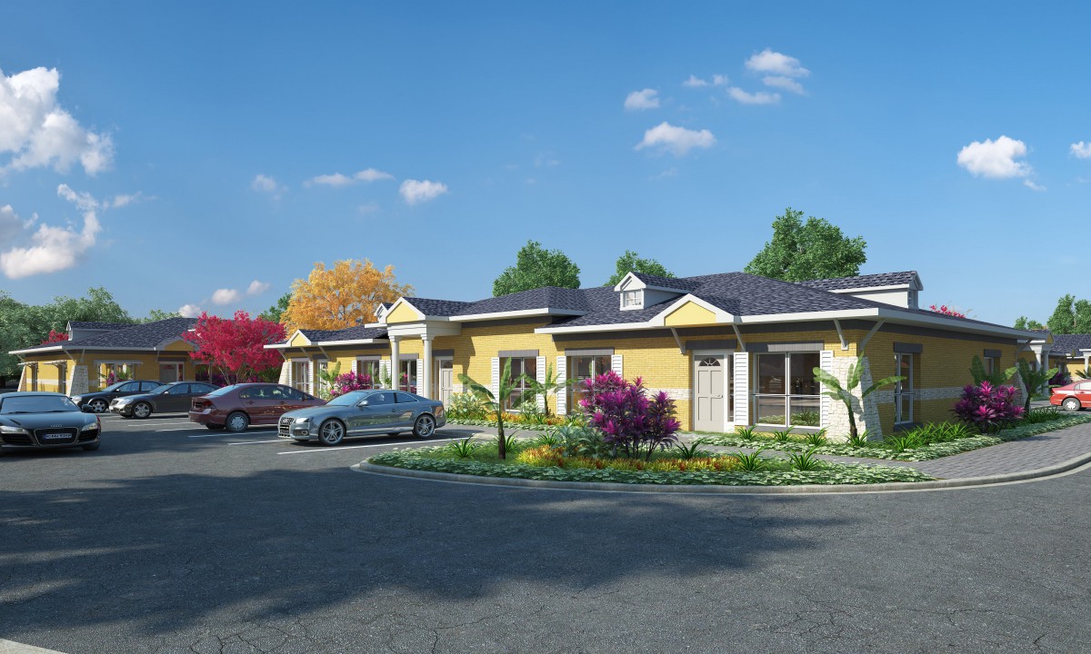 A suburban residential area with parked cars and a landscaped garden under a blue sky.