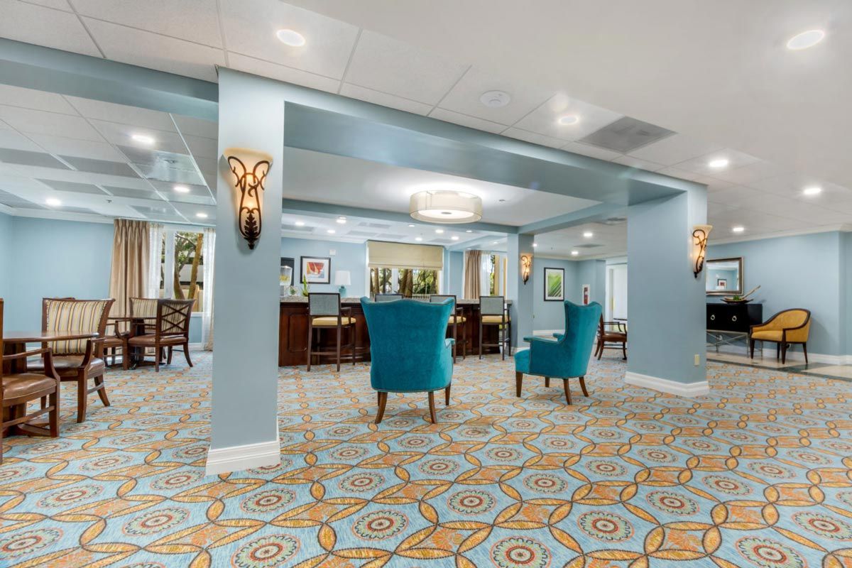 A spacious lobby area featuring comfortable seating and elegant decor.