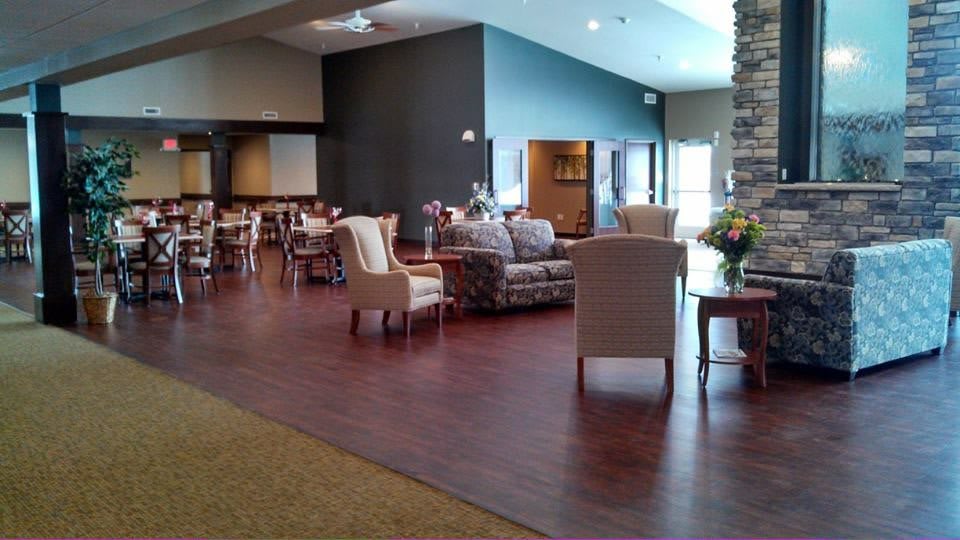 A spacious and elegantly designed lobby area with comfortable seating and warm lighting.