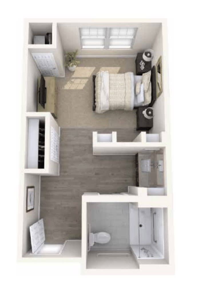 A compact apartment floor plan featuring a bedroom, bathroom, and living area.