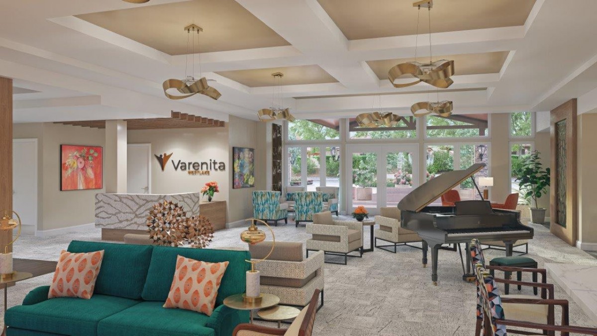 A modern hotel lobby with stylish furniture and elegant lighting.