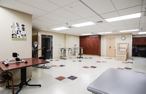 A clean and organized examination room in a healthcare facility.
