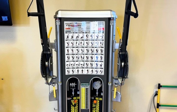 A versatile exercise machine featuring various workout instructions and adjustable settings for strength training.