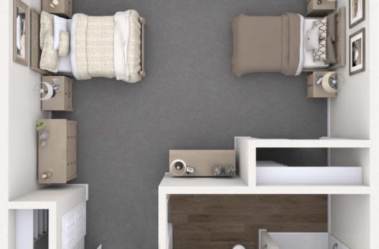 A minimalist bedroom with two single beds and modern furnishings, viewed from above.
