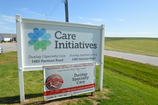 Sign for Care Initiatives and Dunlap Specialty Care located on Harlan Road.