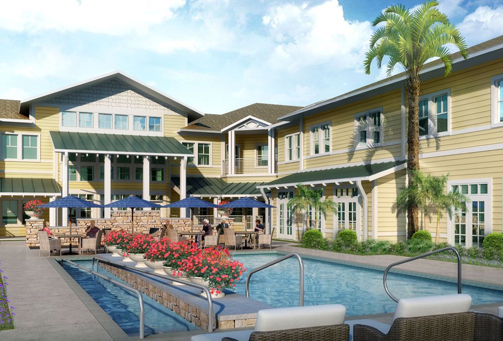 A residential building with an outdoor swimming pool and landscaped surroundings.