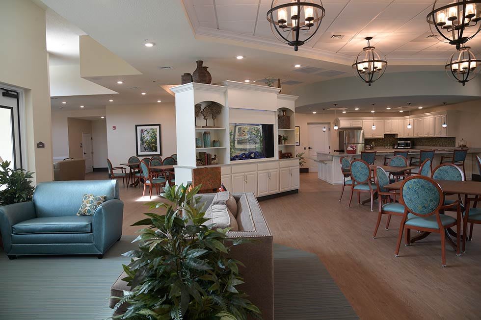 A spacious and elegantly designed living room with cozy seating and tasteful decor.