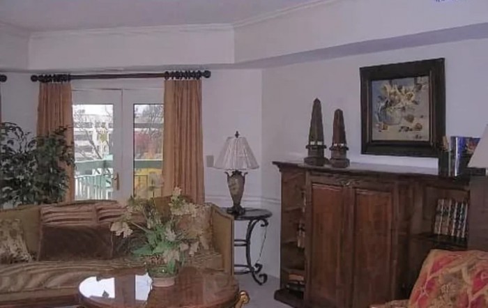 A cozy living room with elegant furnishings and decor.