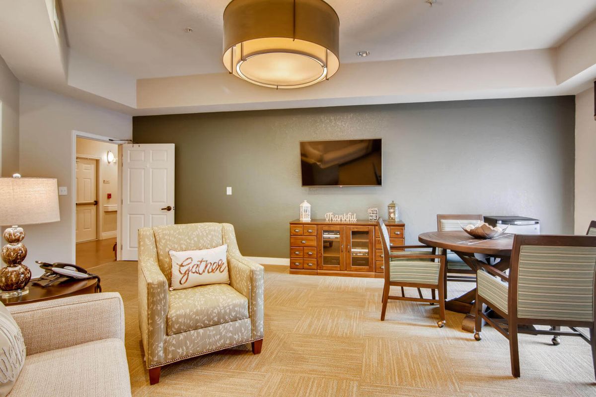 A modern living room with comfortable furniture and elegant decor.