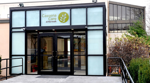 The entrance of Cassandra Care, showcasing modern design and clear signage.