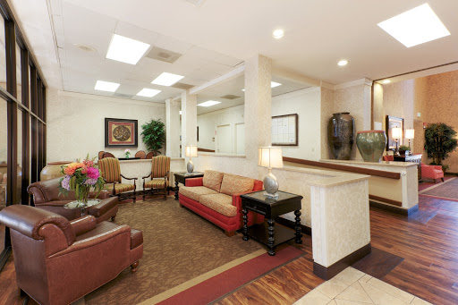 A welcoming lobby space featuring cozy seating and a reception area.