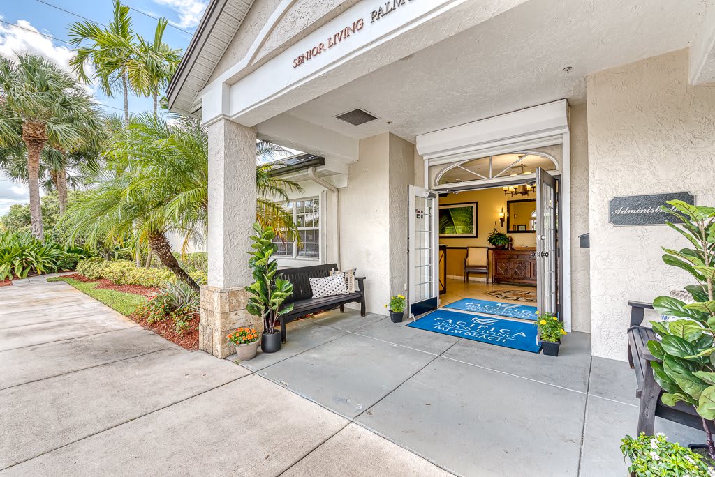 Entrance of a modern building with a welcoming lobby area.