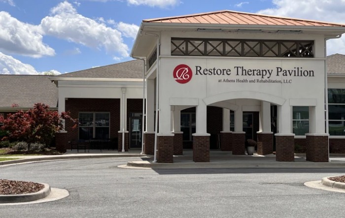 An exterior view of a therapy clinic with its signage visible.