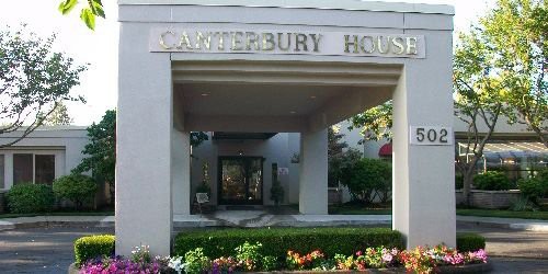 Entrance of Canterbury House with visible signage and surrounding landscaping.