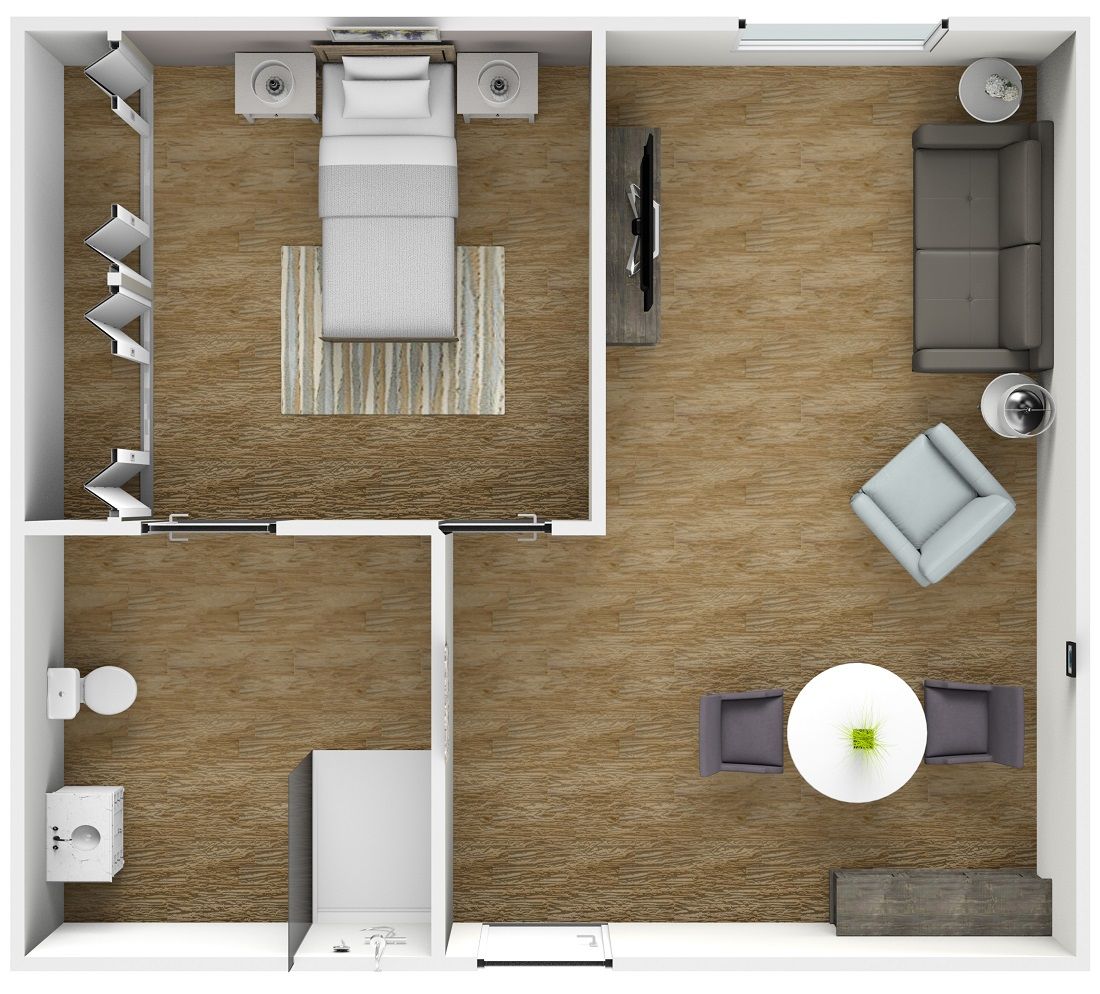 A top-down view of a simple, modern apartment floor plan featuring a living room, bedroom, bathroom, and kitchen area.