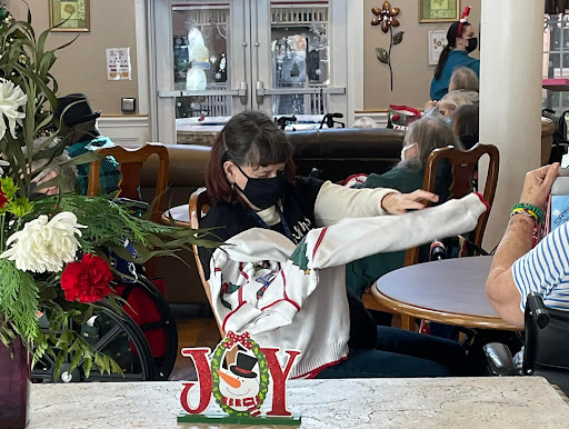 A moment of joy as individuals engage in activities together during the holiday season.