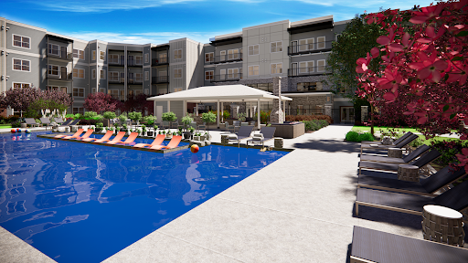 A modern hotel featuring a spacious outdoor pool and relaxing lounge area.