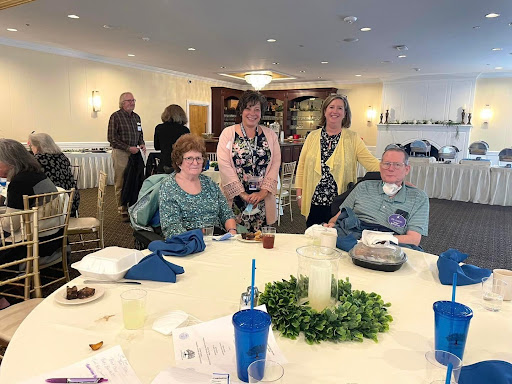 A cheerful gathering of friends at a celebratory event.