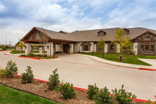A beautifully designed residential building with a welcoming entrance.