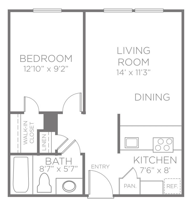 A floor plan of a one-bedroom apartment featuring a living room, kitchen, dining area, and bathroom.