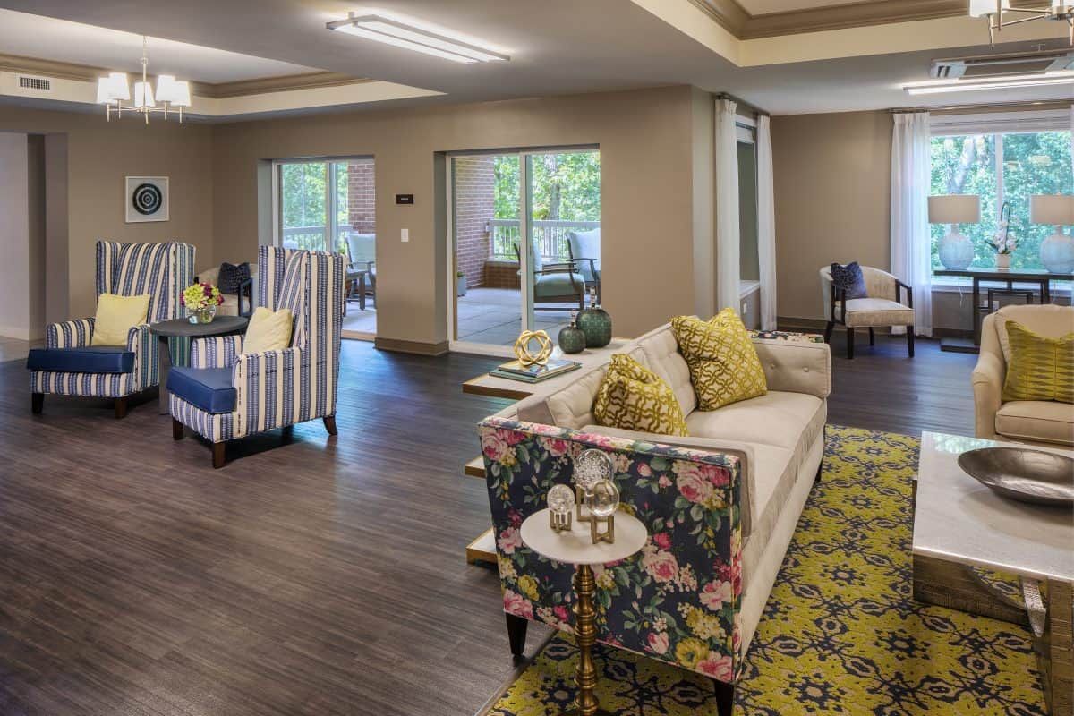 A cozy and well-designed living space featuring comfortable seating and modern decor.