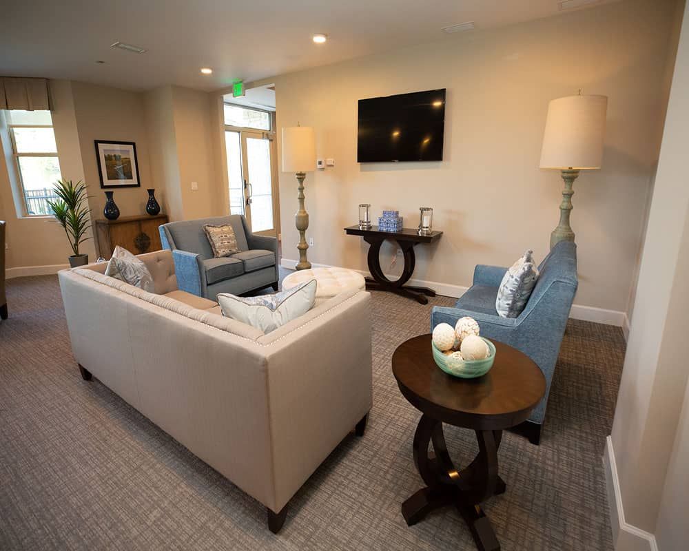 A modern living room with stylish furniture and decor.