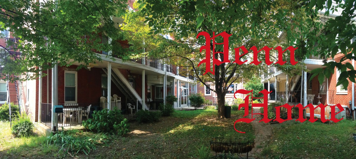 A charming house with a spacious porch surrounded by lush green trees.