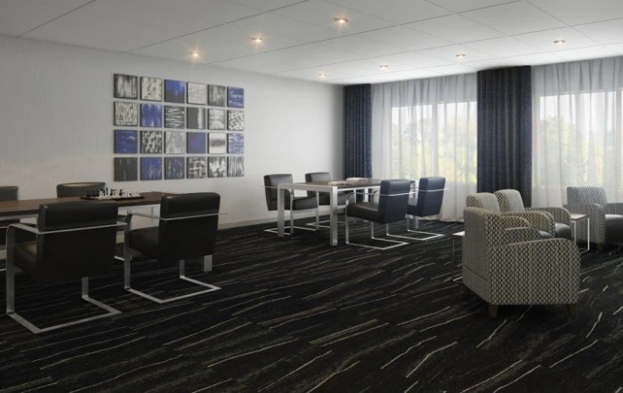 A modern conference room with sleek furniture and contemporary wall art.