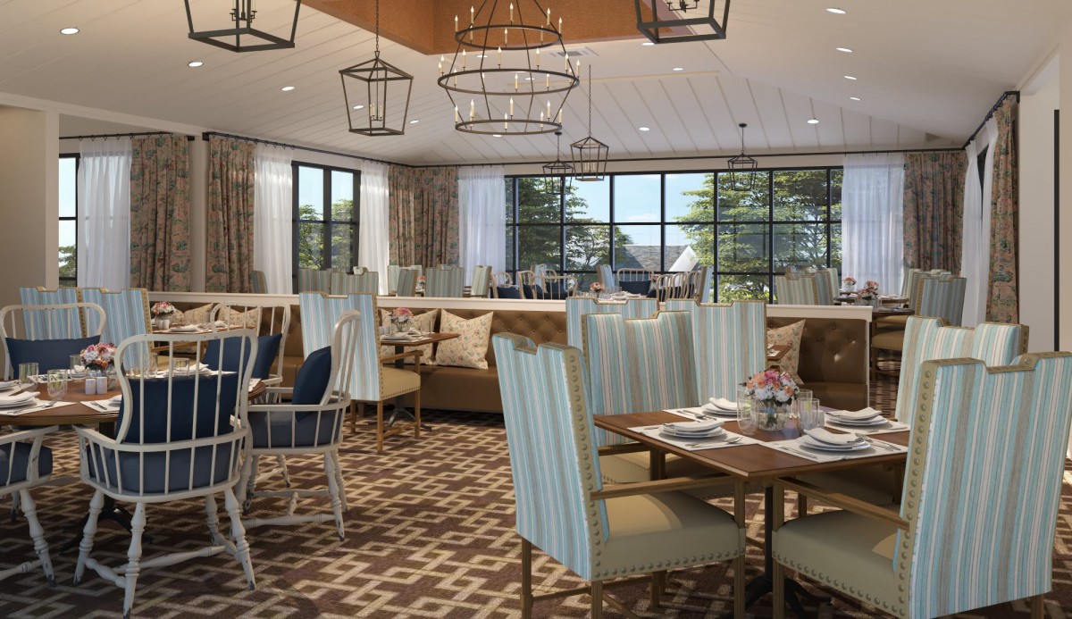 A modern restaurant dining area featuring stylish decor and comfortable seating.