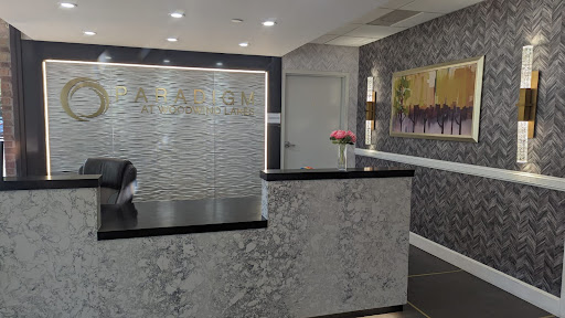 A modern reception area featuring elegant decor and a sleek design.