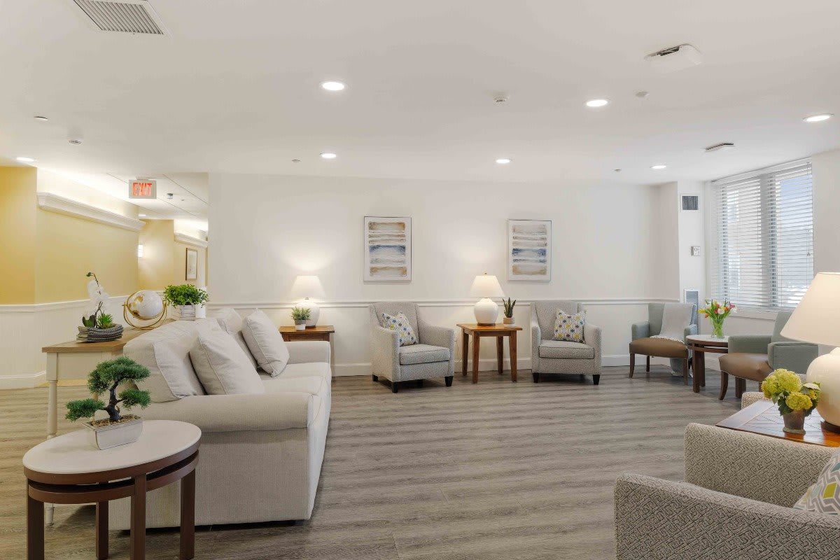 A modern living room with comfortable seating and decorative elements.