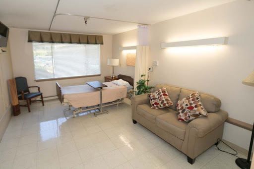 A cozy hospital room designed for comfort and care.