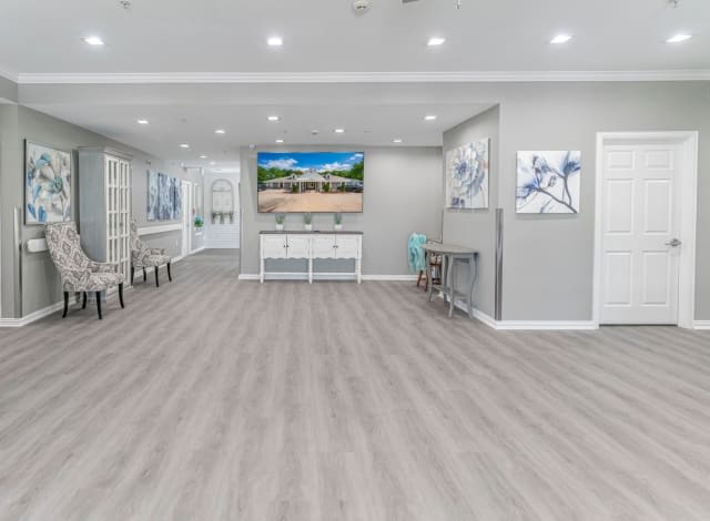 Modern lobby with hardwood flooring and contemporary decor.