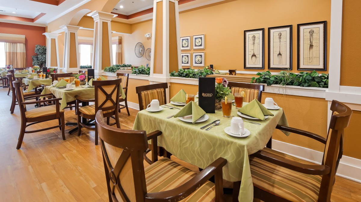 Elegant dining area with neatly arranged tables and classic decor.