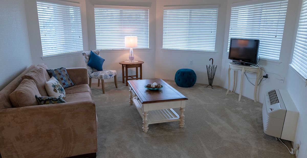 Cozy living room with neutral tones and stylish decor.