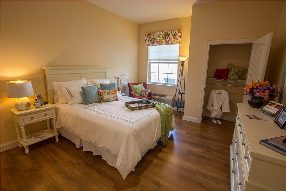 A cozy and bright bedroom with stylish decor.