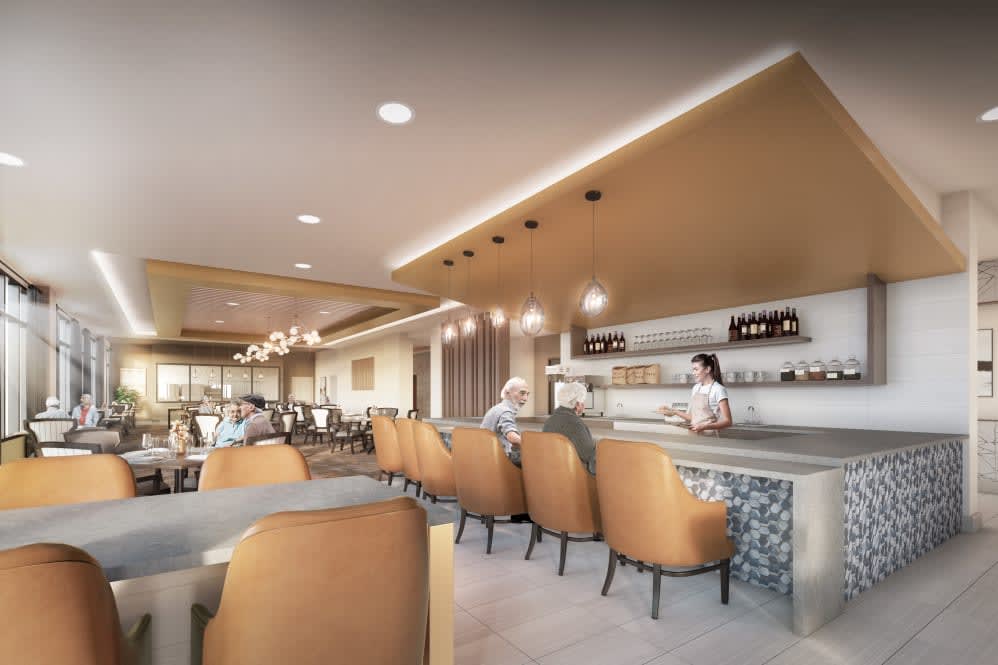 A modern cafe interior with comfortable seating and stylish lighting.
