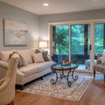 A cozy living room with elegant furniture and natural lighting.