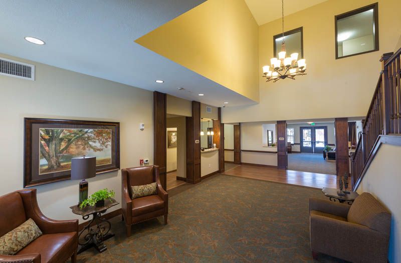 A modern lobby area with comfortable seating and elegant lighting.