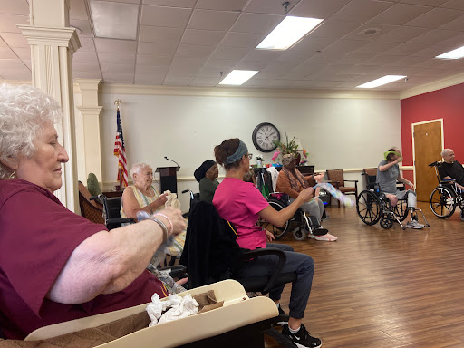 Seniors engaging in a group activity at a community center.