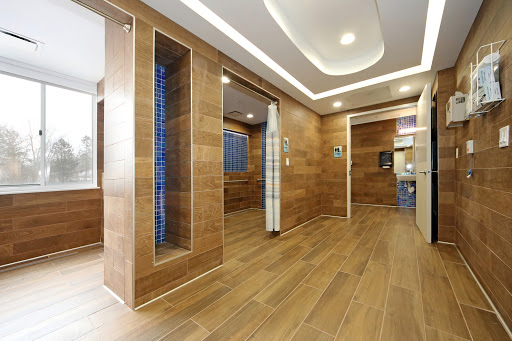 A modern interior featuring warm wooden tones and spacious design elements.