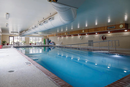An inviting indoor swimming pool designed for relaxation and recreation.